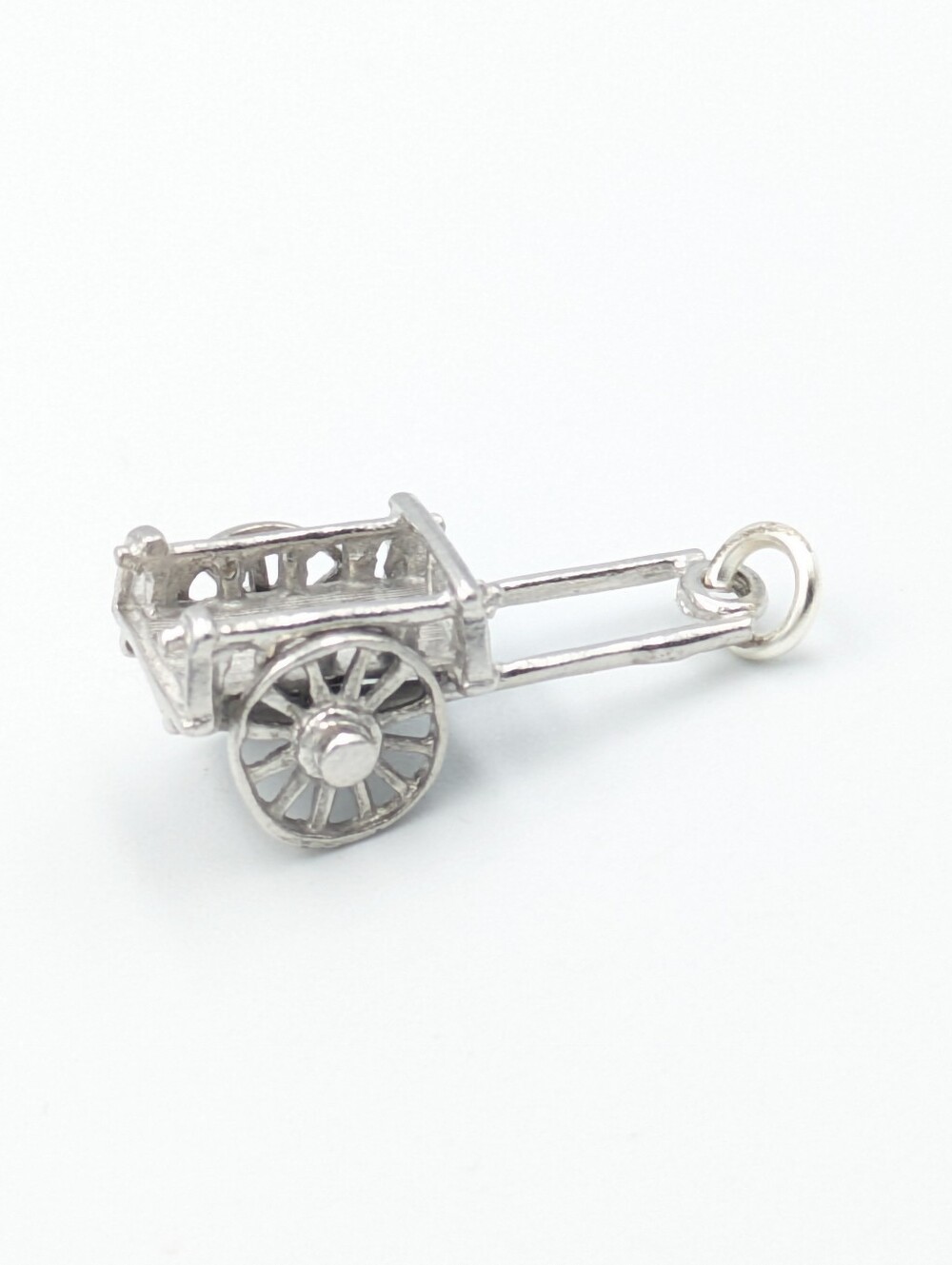 Vintage wagon pendant charm with articulated wheels